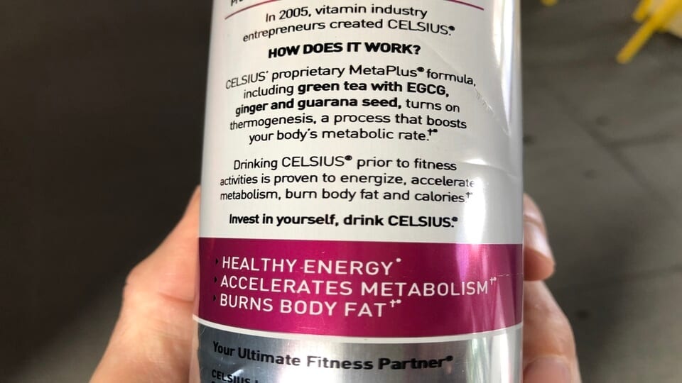 The back label of Celsius energy drink showing some important information.