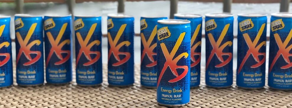 Cans of XS energy drink.