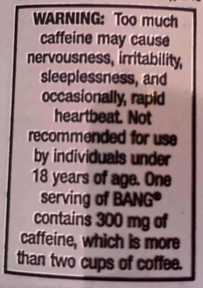 The warnings printed on the back of a can of Bang.