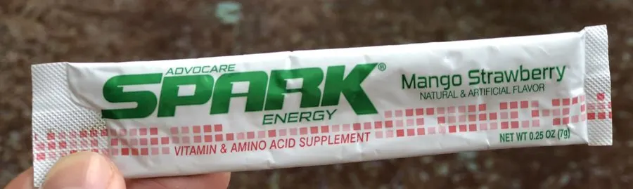 A sachet of Mango Strawberry Advocare Spark energy powder