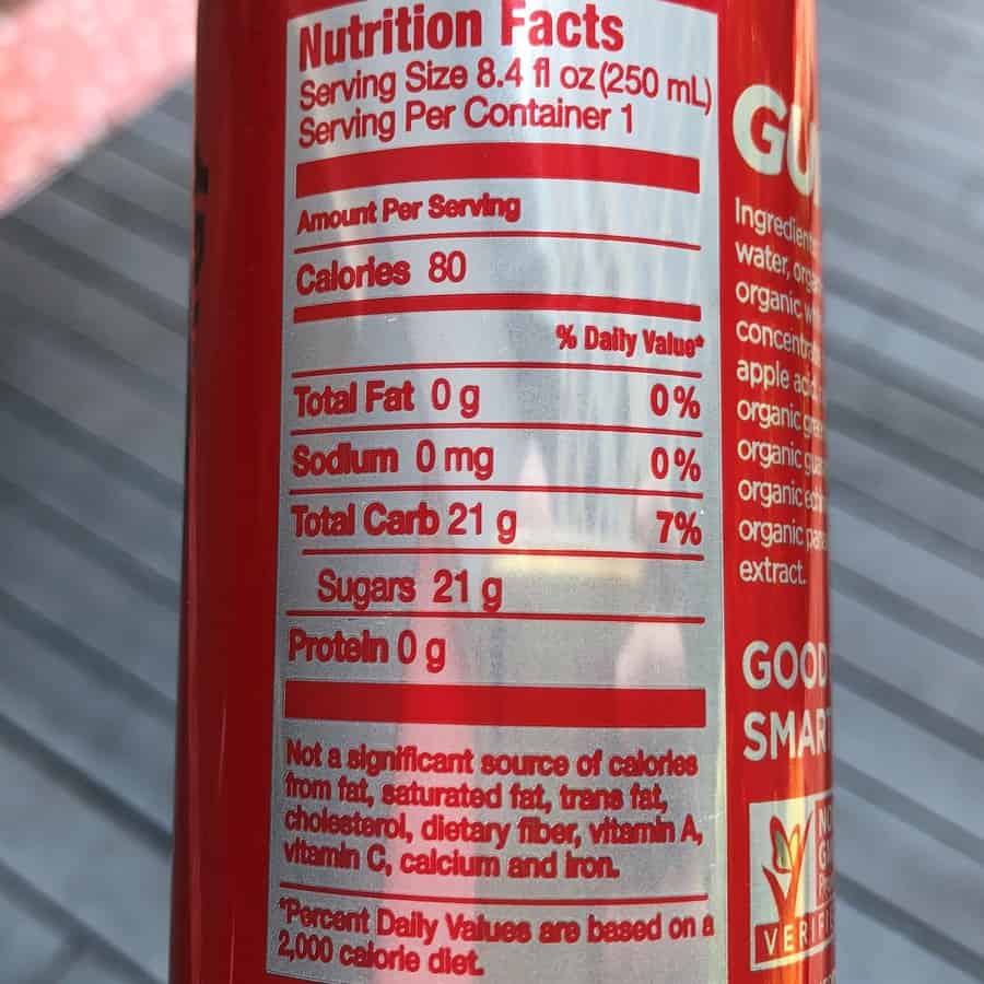 The nutritional label behind a can of GURU Energy Drink. 