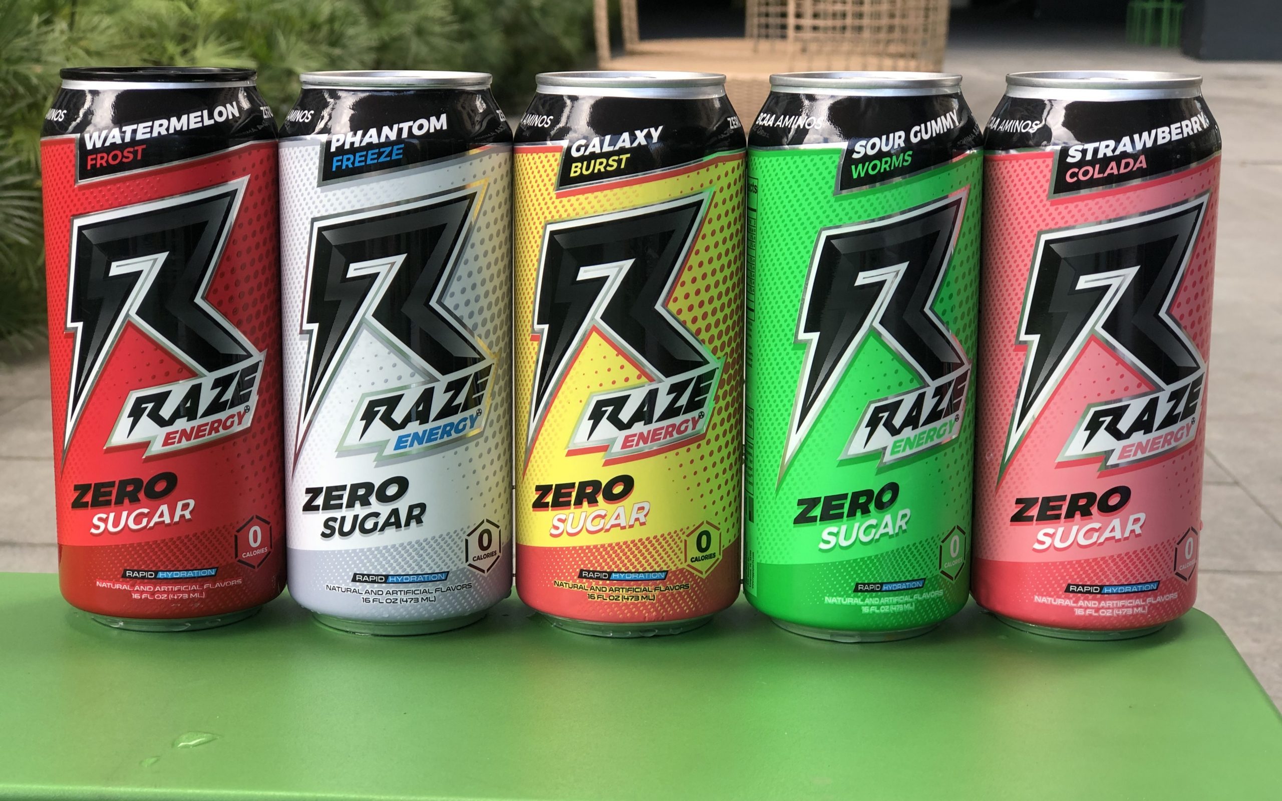 Close up of cans of Raze Energy Drink.