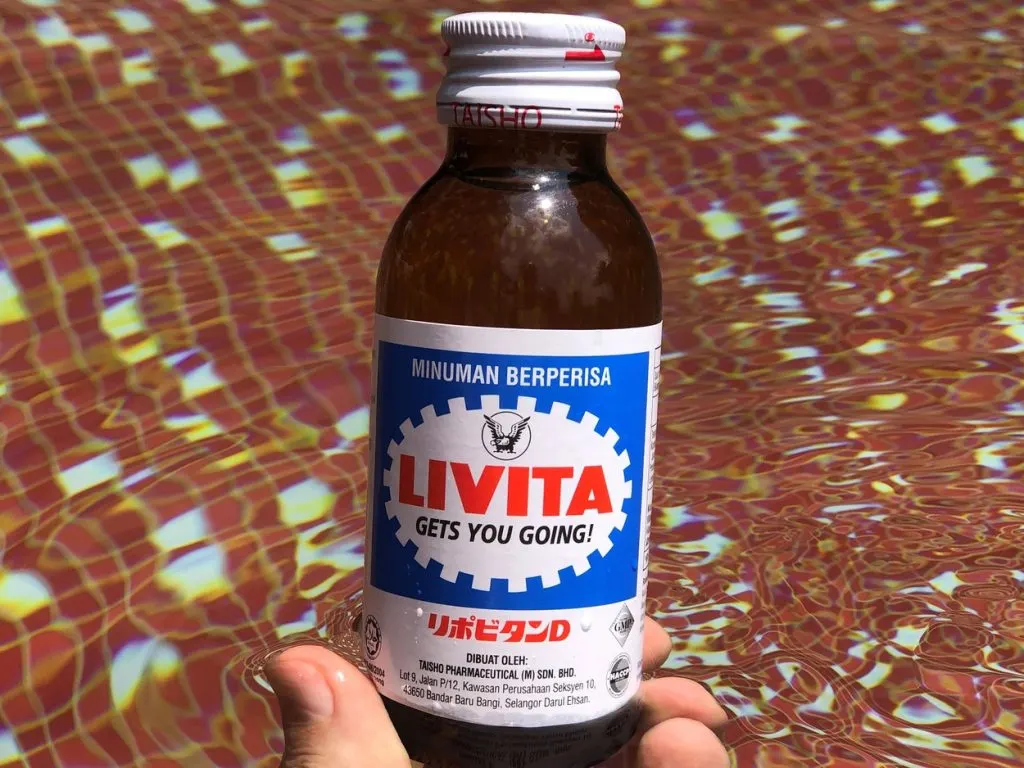 A 3fl.oz bottle of Livita Energy being held in full view.