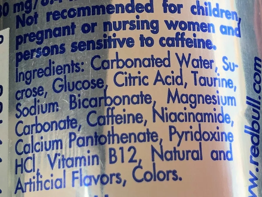 Close-up ingredients label of Red Bull.