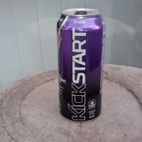 A picture of a can of Mountain Dew Kickstart in full view on a table.