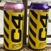 Two cans of C4 Energy drinks beside each other.