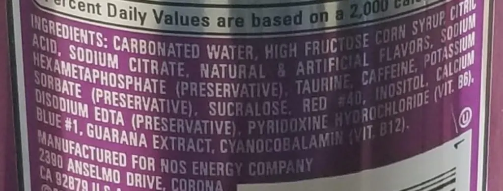 Close-up of the ingredients in a can of NOS (GT Grape flavour)