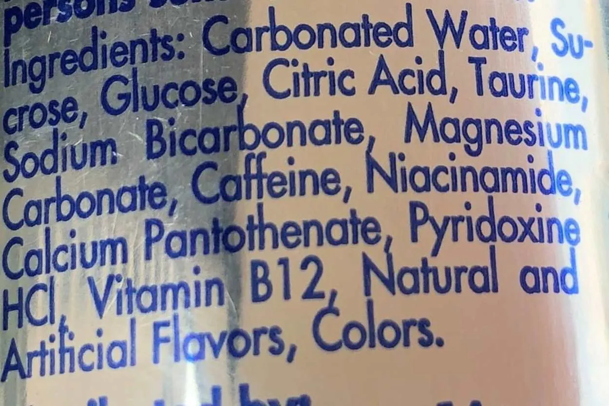 The ingredients list at the back of a can of Red Bull. 