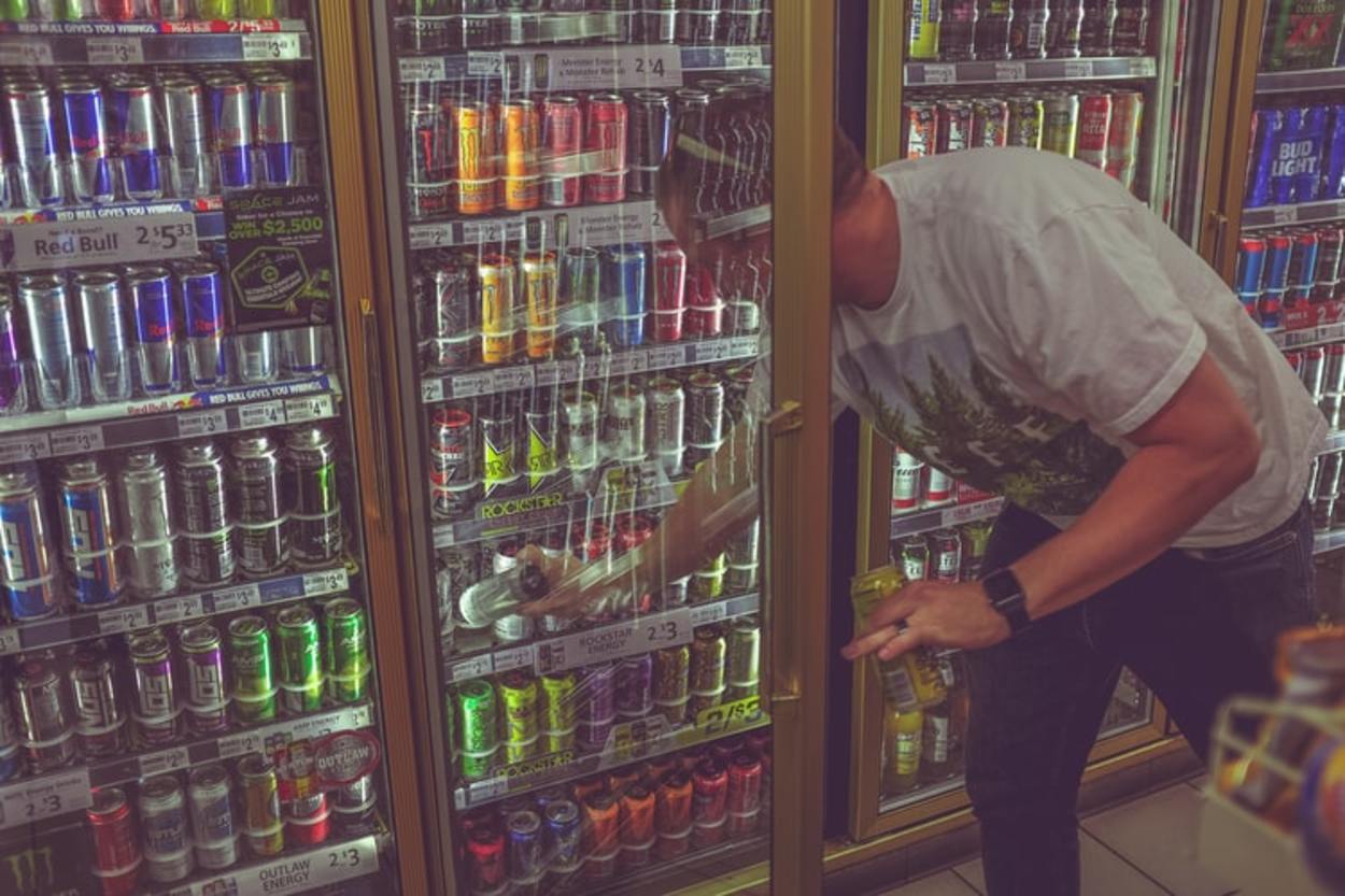 A man buying energy drinks
