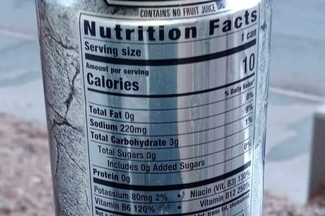 Reign energy drinks nutrition facts printed on the side of the can.