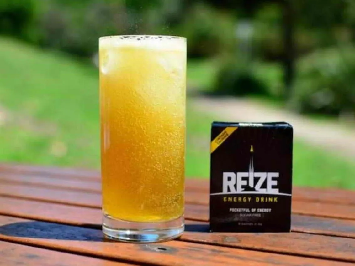 A glass of REIZE Energy Drink.