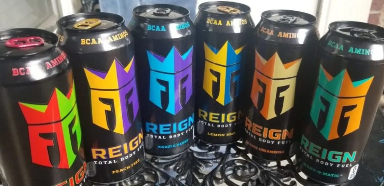 A row of REIGN energy drinks.