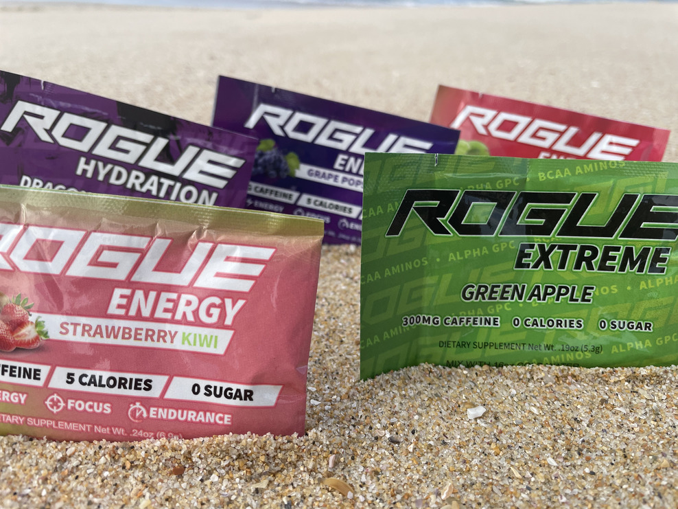 Rogue Energy Drink Different Flavors: Strawberry Kiwi, Green Apple, Grape Popsicle, Dragon Fruit Mango Hydration, and Fruit Punch.