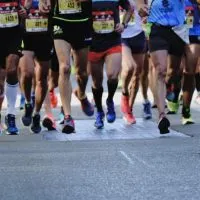 Leg shot of Marathon runners in their running wears.