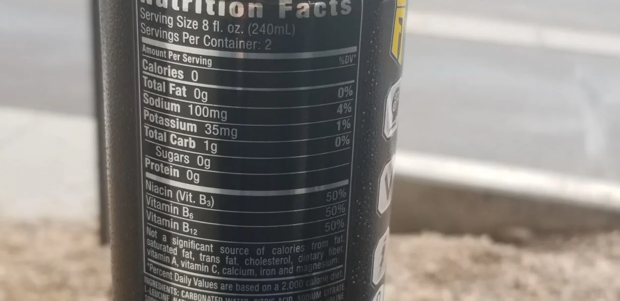 Nutrition facts of Reign energy drinks printed on the side of the can.