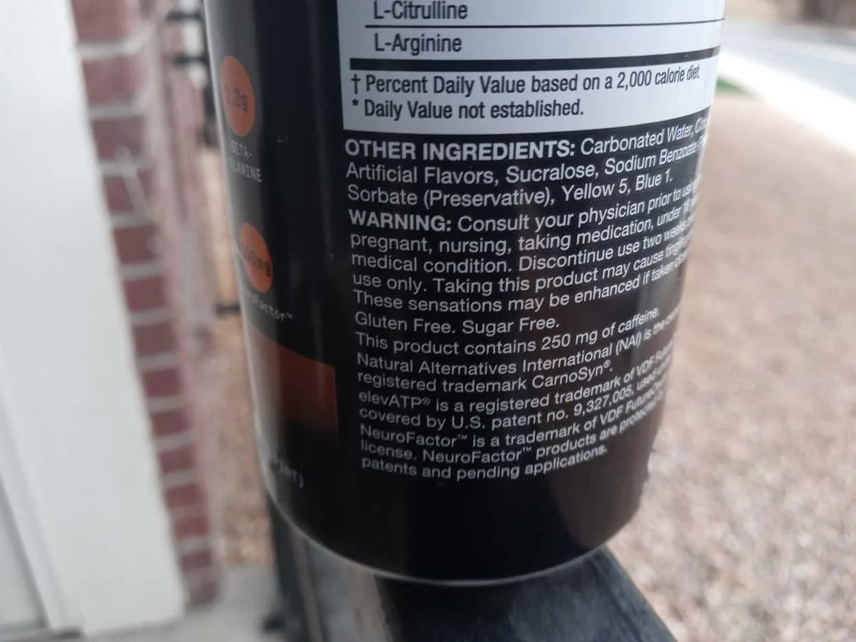 Back label of Lit Energy drink showing its ingredients and warnings.