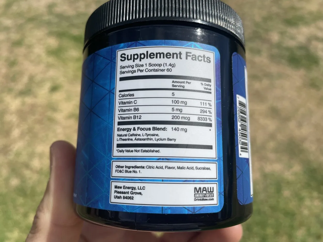 Supplement facts label and other information printed on the side of Maw Energy Drink tub.