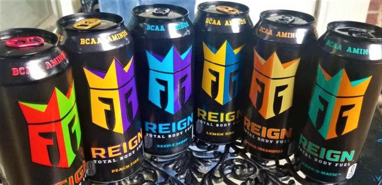 A selection of Reign Energy Drink Flavors in a row.
